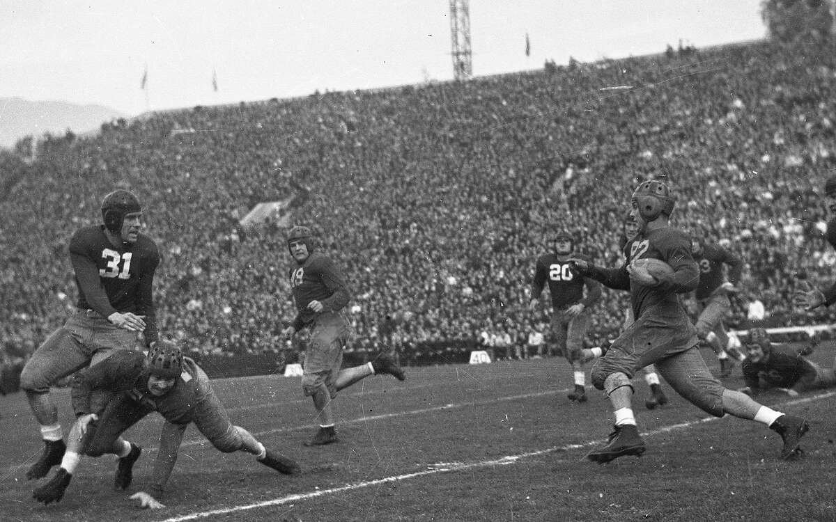 Cal Bears beats Alabama in the Rose Bowl, January 1, 1938 Here Vic Bottari (92) breaks into the open as Dave Anderson (56) and Johnny Meek (49) lead the way.