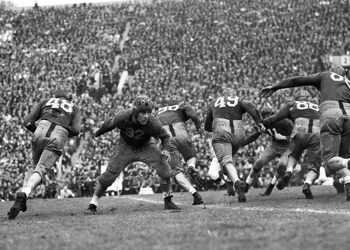 Cal Bears beats Alabama in the Rose Bowl, January 1, 1938 Here Henry Sparks blocks as Sam Chapman(48) runs behind Dave Anderson (56) and Johnny Meek (49)