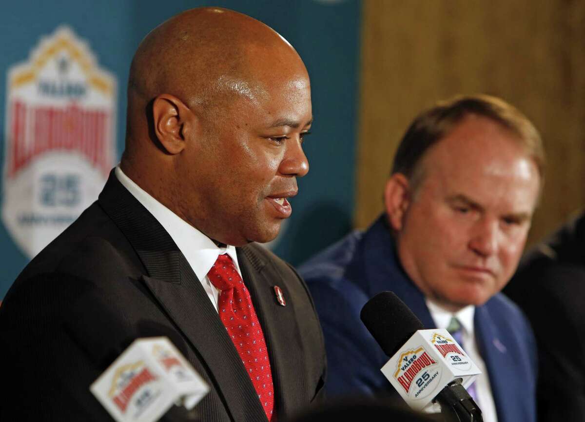 David Shaw,head coach of Stanford, left, , and Gary Patterson head coach at TCU answers questions at the Valero Alamo Bowl head coaches press conference at Sonterra on Thursday, Dec. 7, 2017.