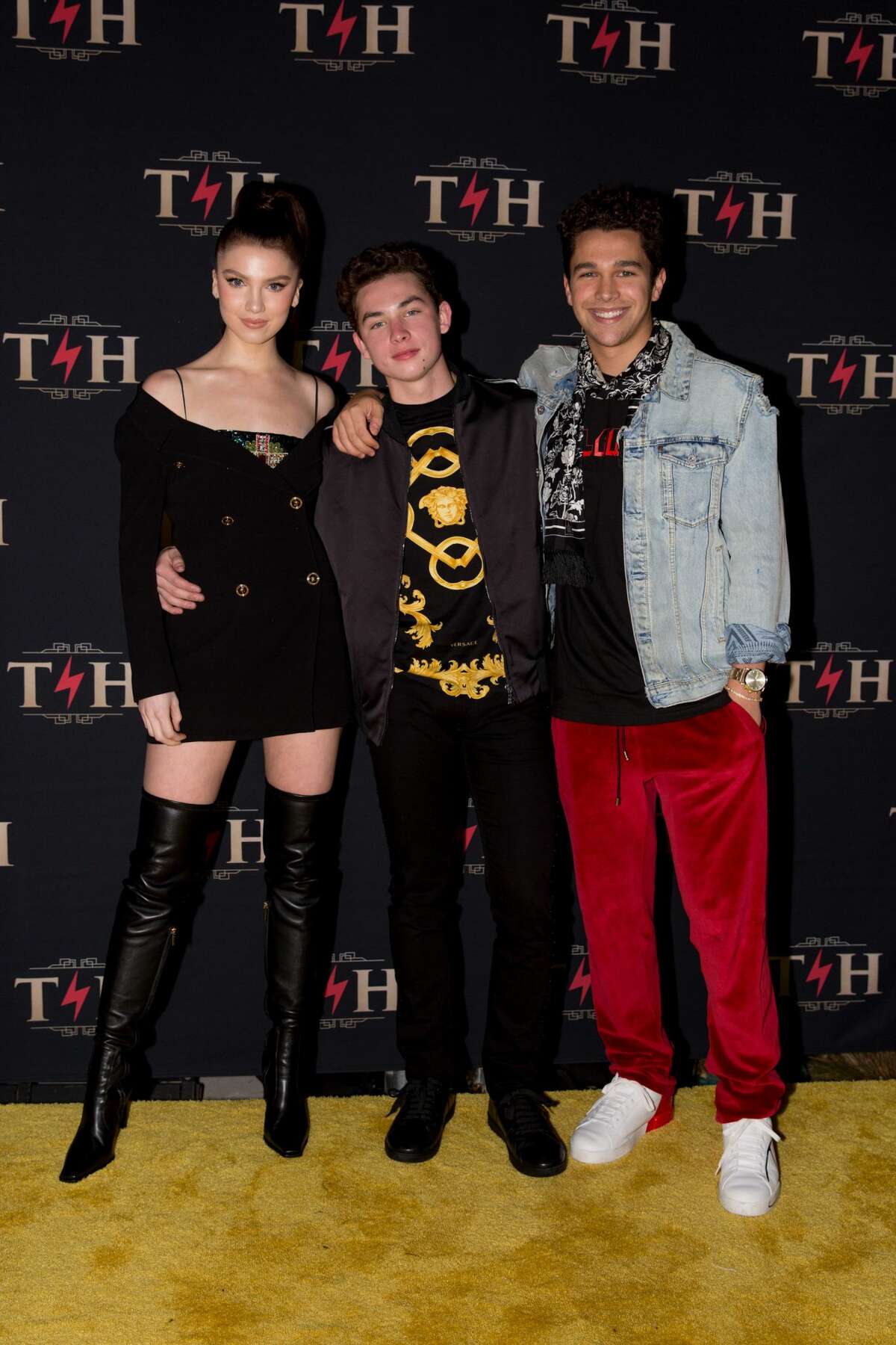 Pop sensation Austin Mahone was all smiles as he snapped photos with Thomas and Maya Henry at Thomas' star-studded 4 million dollar birthday celebration at Hotel Discotheque over the weekend in San Antonio, TX. There were performances by Migos and J Balvin, a special DJ set by Diplo and DJ Ruckus, aerial performers, burlesque dancers, contortionists and more!