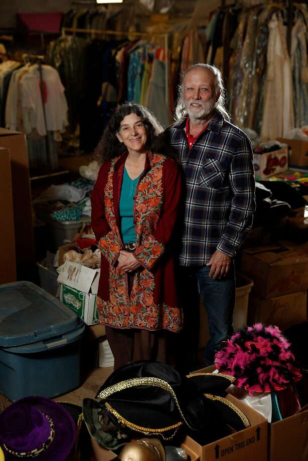 Lesley Currier (left) and her husband, Robert Currier, are surrounded by Marin Shakespeare Company costumes in a storage area at their new, year-round downtown theater space in San Rafael. Photo: Carlos Avila Gonzalez, The Chronicle