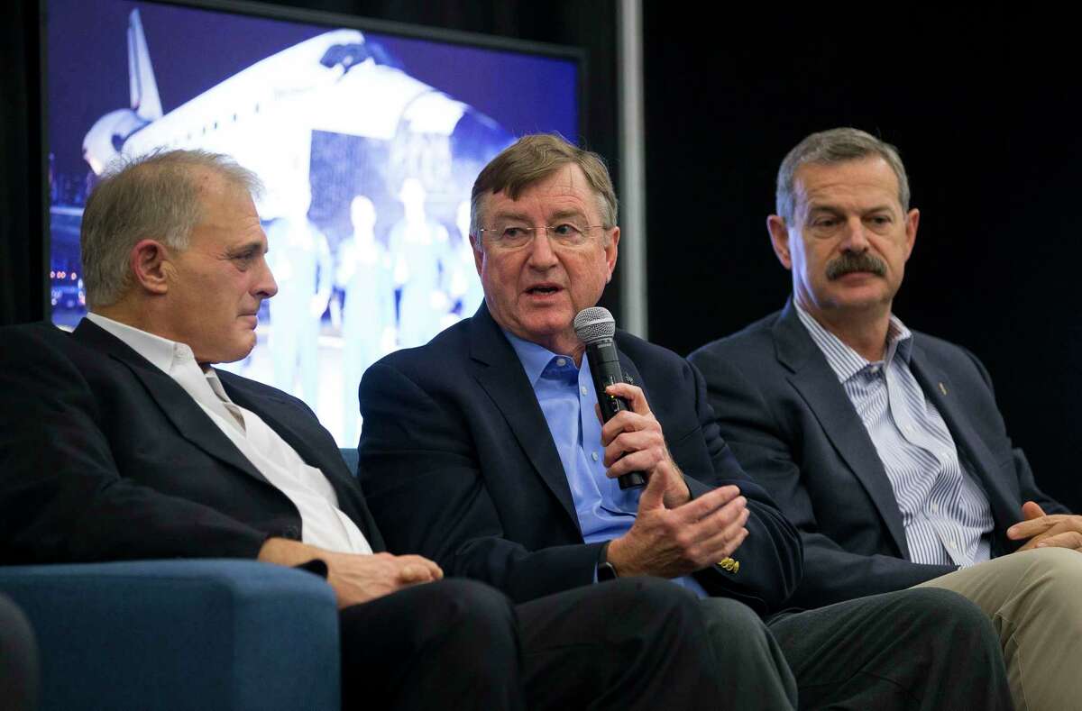 Oribital ATK's Frank Culbertson, Jr. (center), a veteran astronaut, speaks on a panel featuring astronauts, including Dave Wolf (left) and Scott Altman (right), who have transitioned to the business world during the third annual Space Commerce Conference and Exposition, SpaceCom, Thursday, Dec. 7, 2017, in Houston. All of the astronauts on the panel have made the transition to business world relating to space. ( Mark Mulligan / Houston Chronicle )