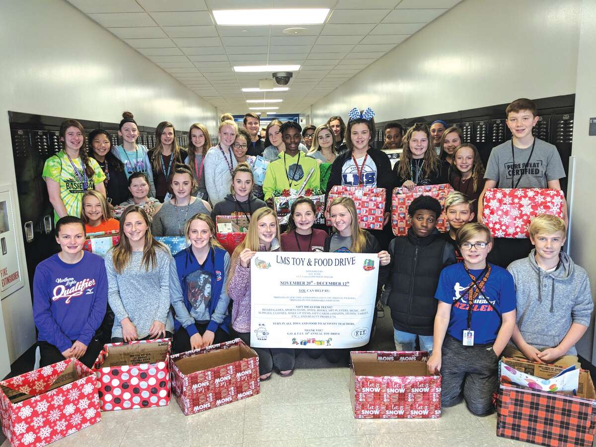 Members of Liberty Middle School’s F.I.T. and G.O. clubs are prepared for their 18th Annual Toy and Food Drive.