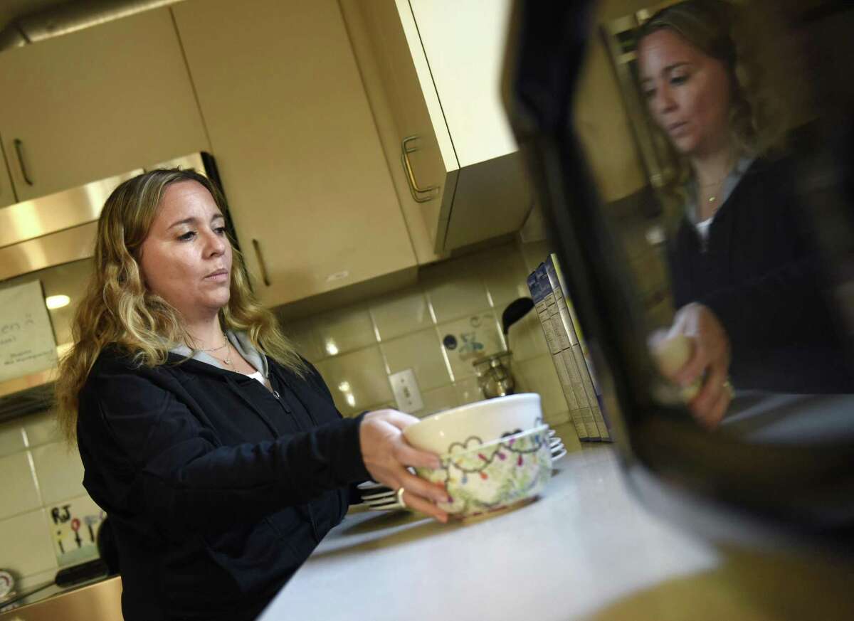 Kids in Crisis Clinical Director Kimberly Wolfson-Lisack works in the kitchen of the children’s house at the Kids in Crisis headquarters in Cos Cob.
