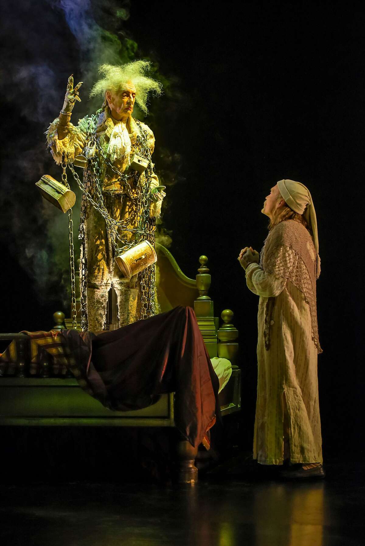 From left: Ken Ruta as the Ghost of Jacob Marley and James Carpenter as Ebenezer Scrooge (at select performances) in American Conservatory Theater's "A Christmas Carol."