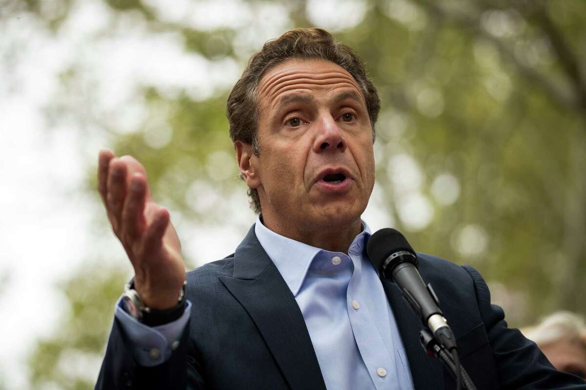 File - Gov. Andrew Cuomo speaks during a rally of hundreds of union members in support of IBEW Local 3 (International Brotherhood of Electrical Workers) at Cadman Plaza Park, September 18, 2017 in the Brooklyn borough of New York City. Gov. Andrew Cuomo said that politicians should focus on the issue of assaults on women rather than the political donations that embattled Hollywood executive Harvey Weinstein has made to his campaign and others. (Photo by Drew Angerer/Getty Images)
