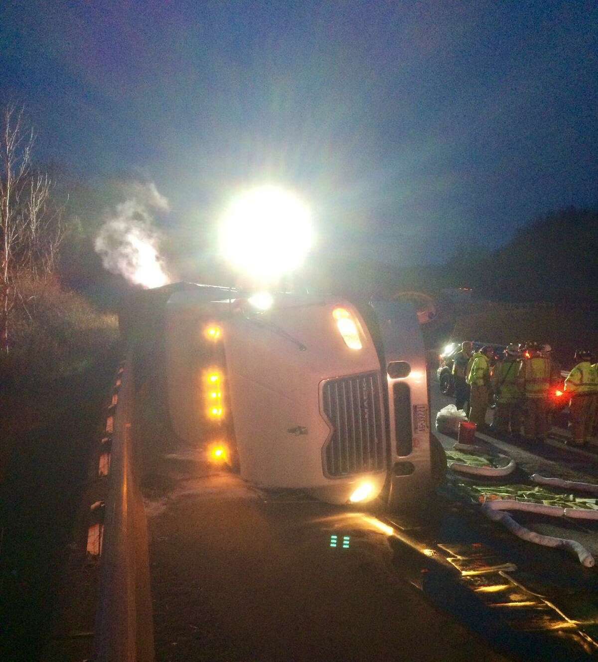 A tractor trailer containing 5,000 live chickens overturned on I-84 East around 6 a.m. Saturday morning.