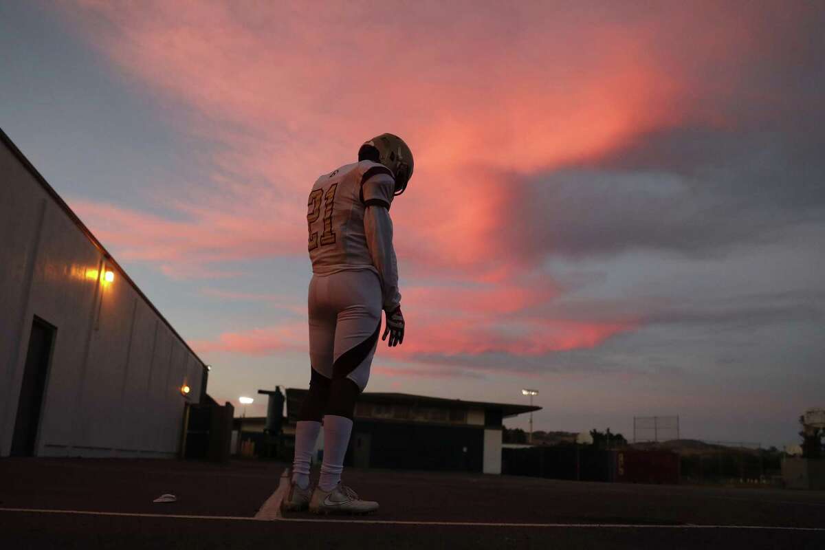 Cardinal Newman’s Nikko Kitchen prepares to play Rancho Cotate on Oct. 23 in the school’s first game since the Tubbs Fire struck Santa Rosa.