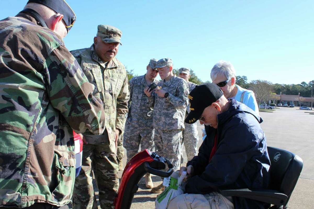 ALP 411 serves hundreds of turkeys to WWII Vets, hurricane survivors