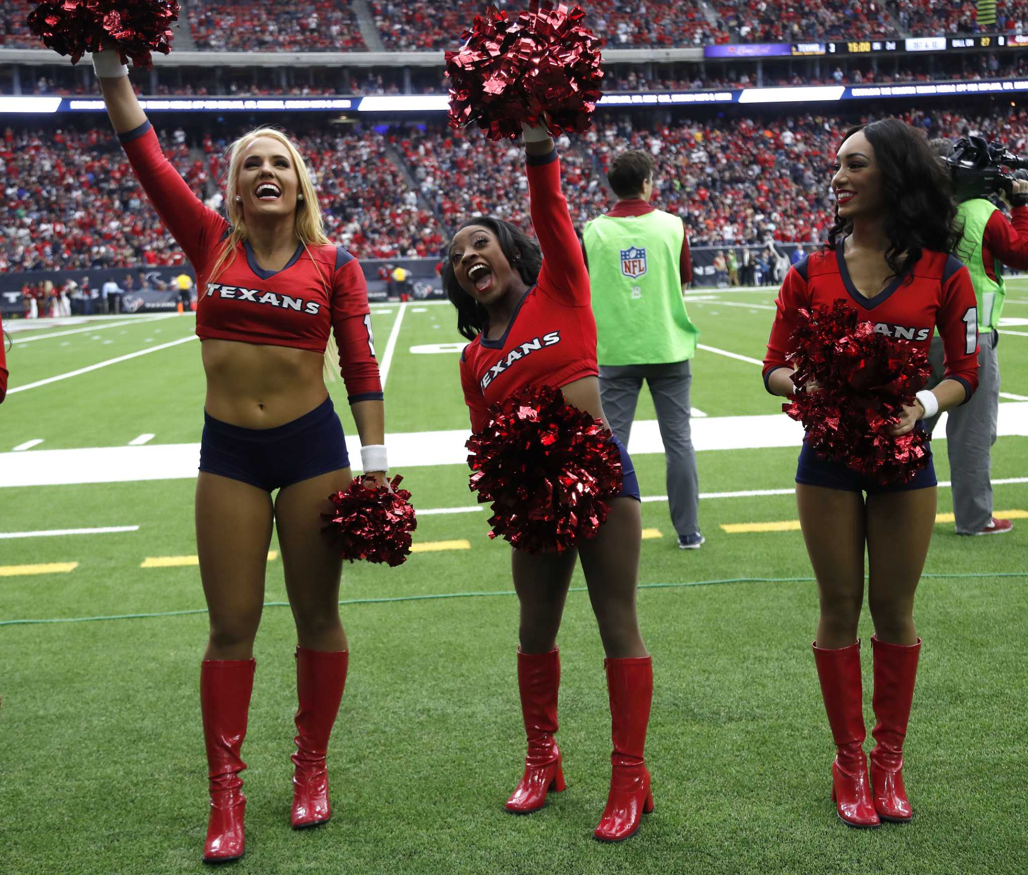 Simone Biles appears as guest Texans cheerleader