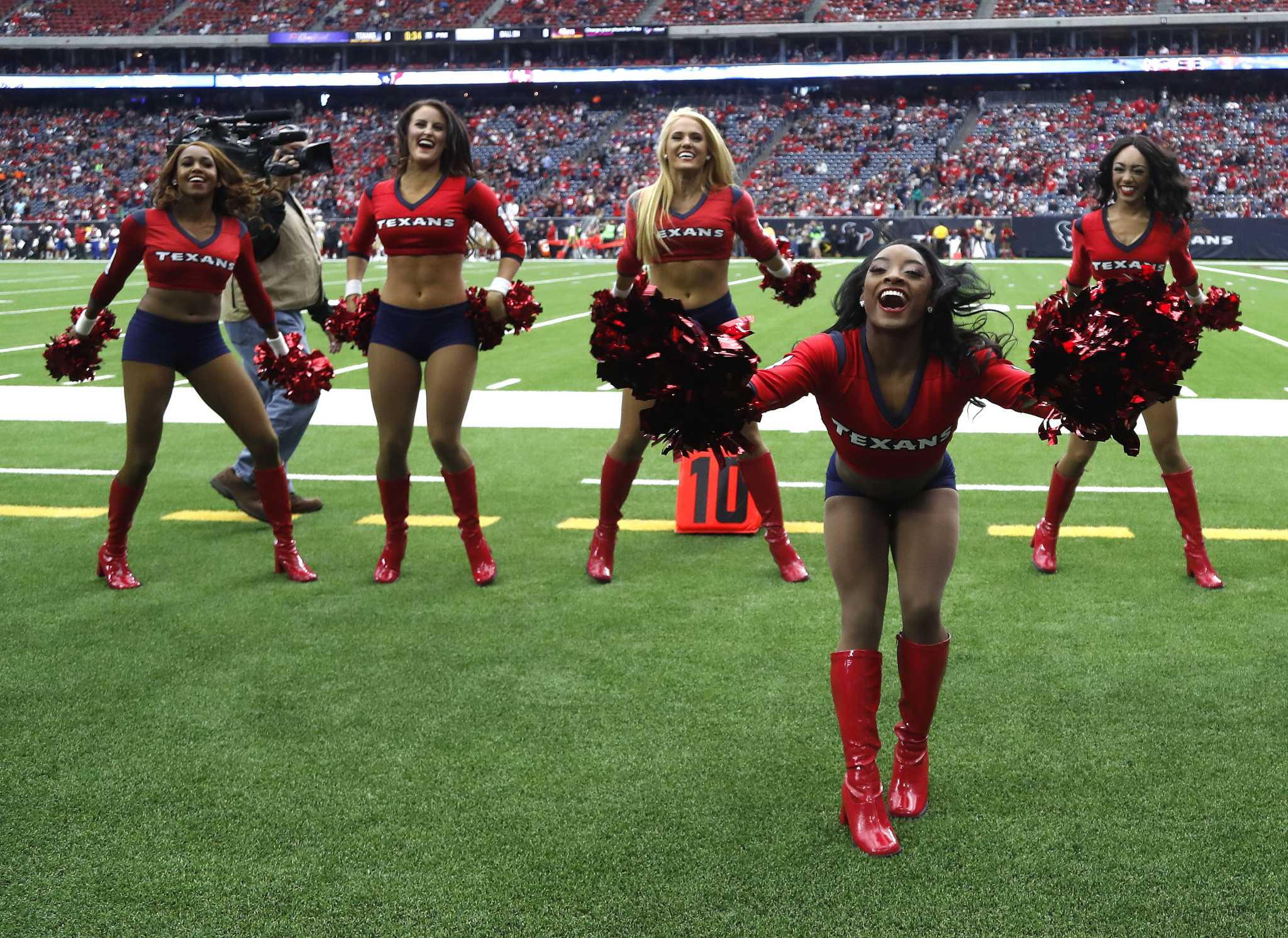 Simone Biles Slays Guest Performance With Texans Cheerleaders