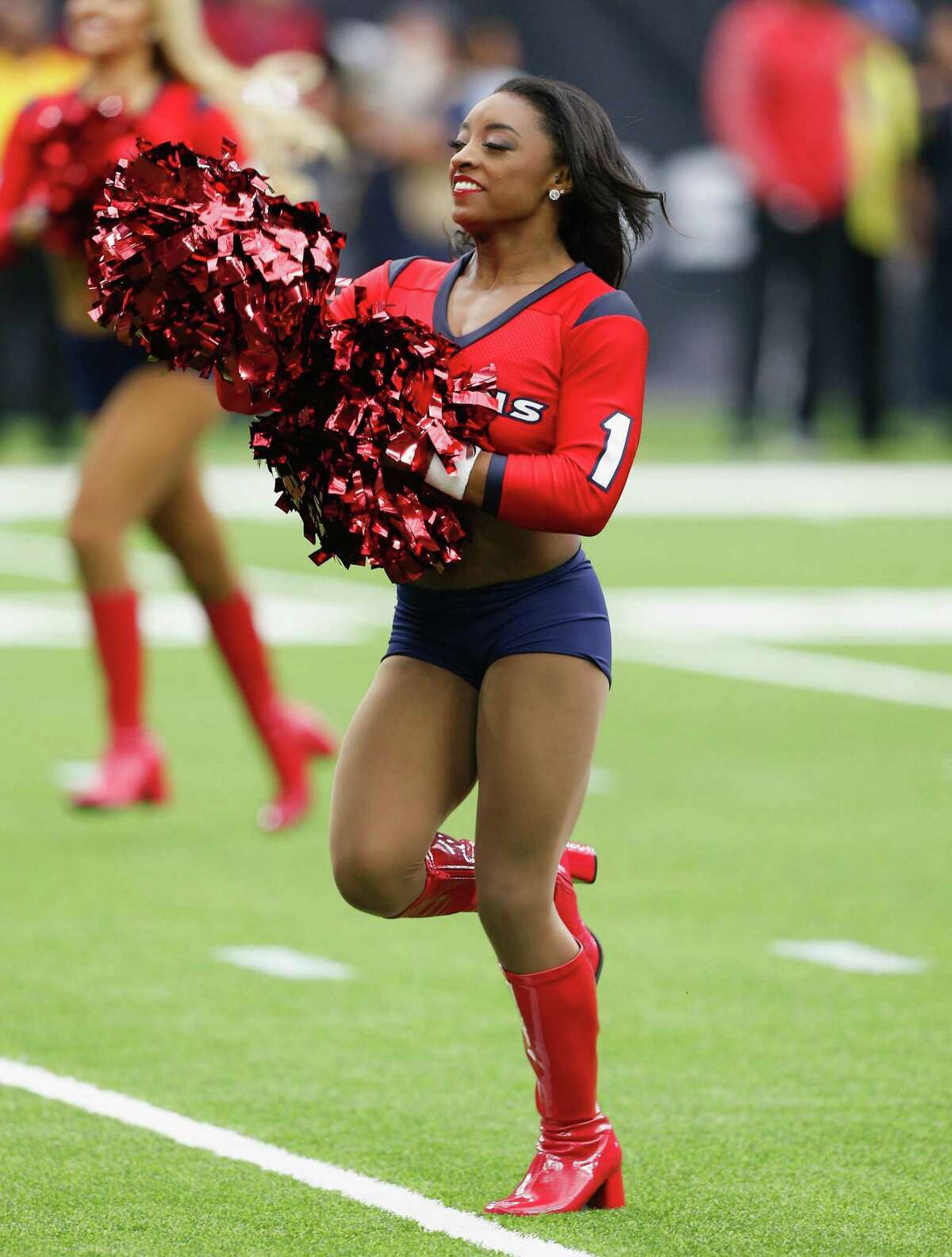 Simone Biles hair-shamed before her amazing Houston Texans cheerleading
