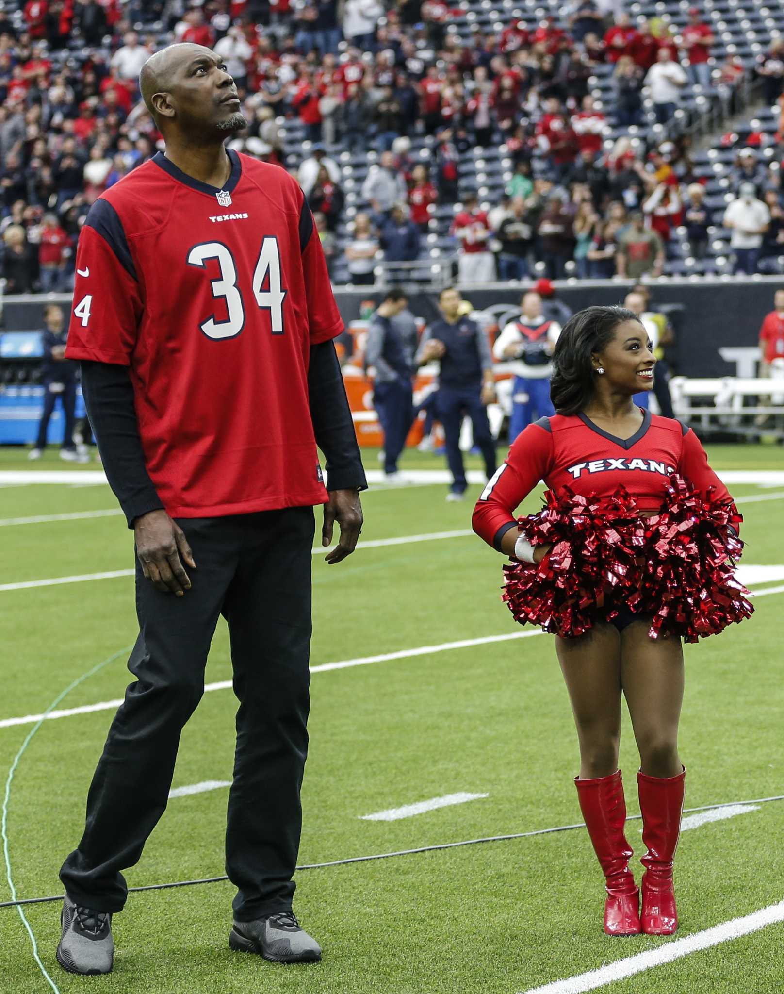 Simone Biles appears as guest Texans cheerleader