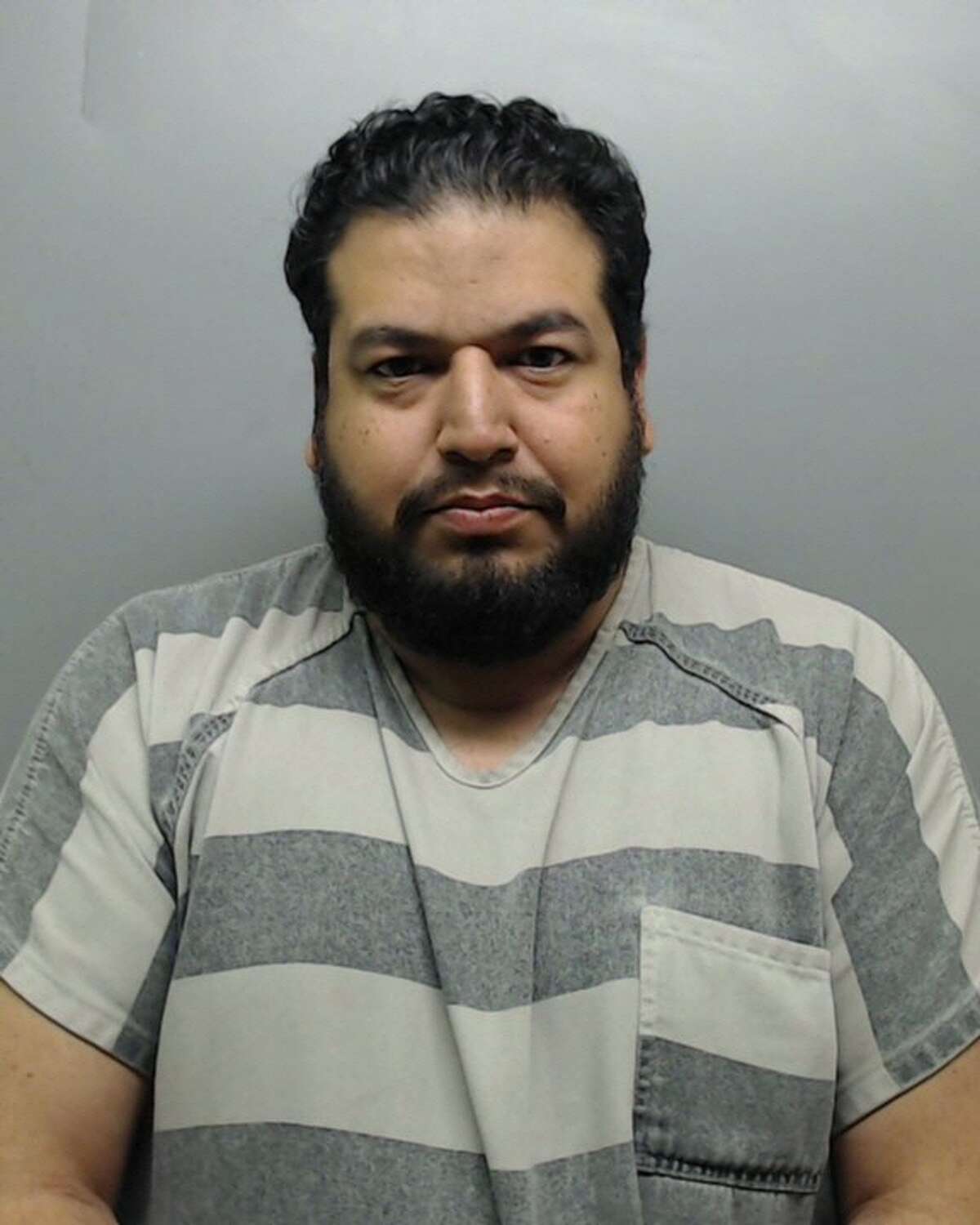 Ruben Guillermo Ulloa, 37, was served with a warrant charging him with sexual assault.