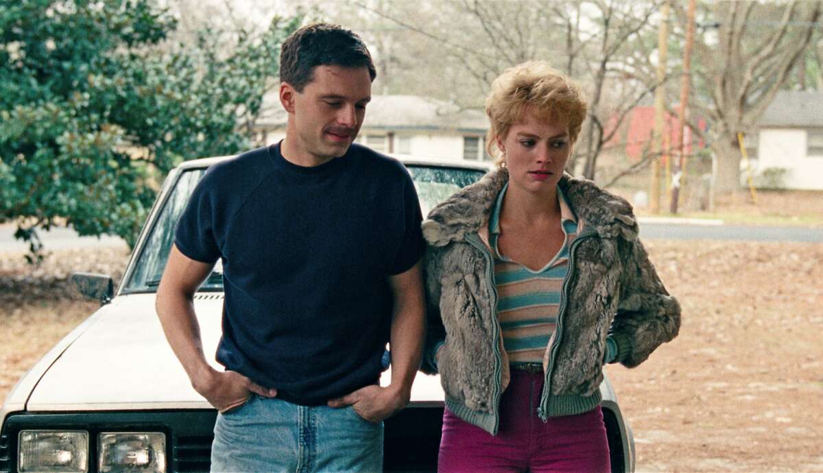 This image released by Neon shows Sebastian Stan as Jeff Gillooly, left, and Margot Robbie as Tonya Harding in a scene from "I, Tonya." On Monday, Dec. 11, 2017, Robbie was nominated for a Golden Globe for best actress in a motion picture comedy or musical for her role in the film. The 75th Golden Globe Awards will be held on Sunday, Jan. 7, 2018 on NBC. (Neon via AP)