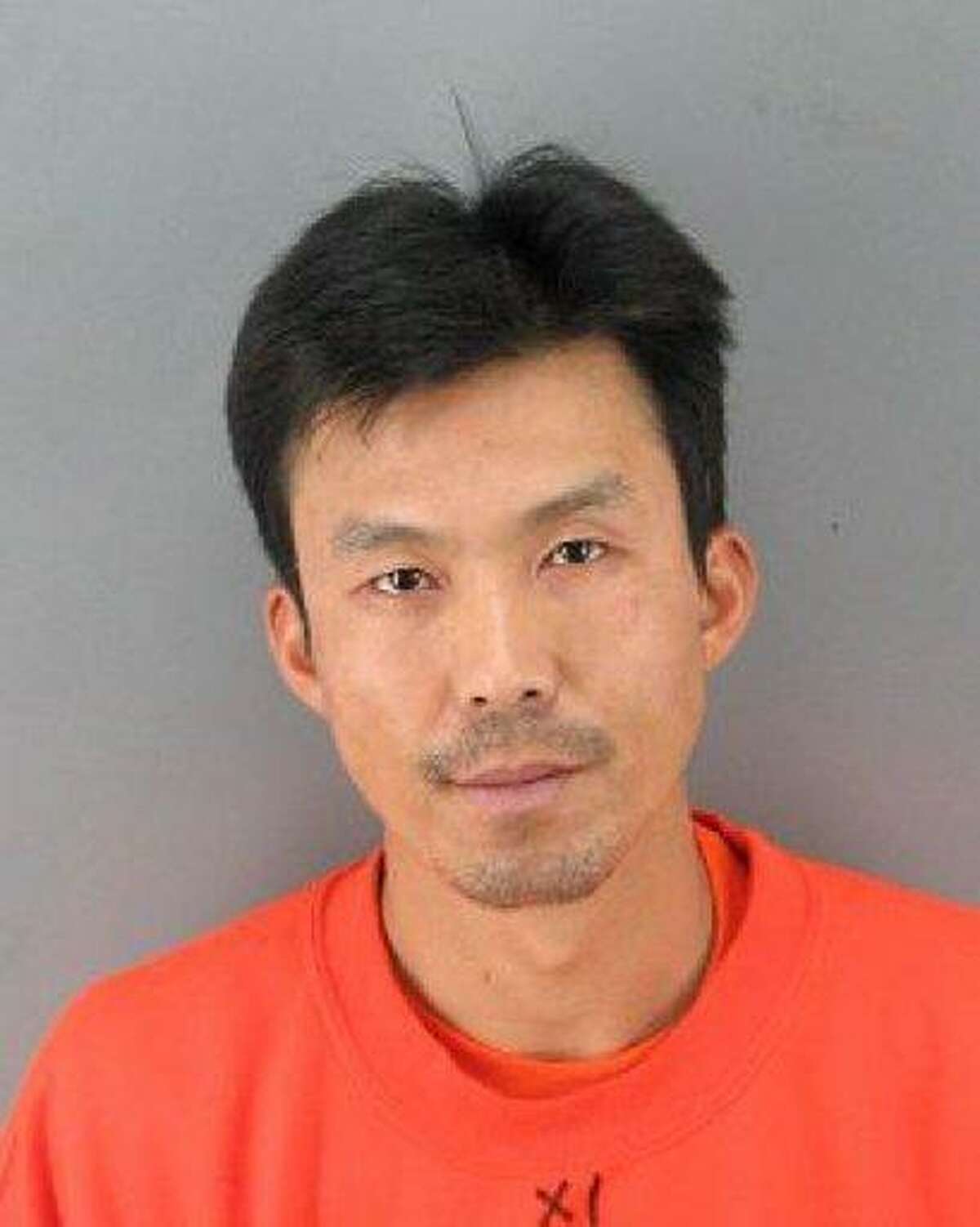 FILE-- This booking photo provided by the San Francisco Police Dept. shows Binh Thai Luc, who was arrested Sunday, March 25 2012 and was charged with five counts of murder.