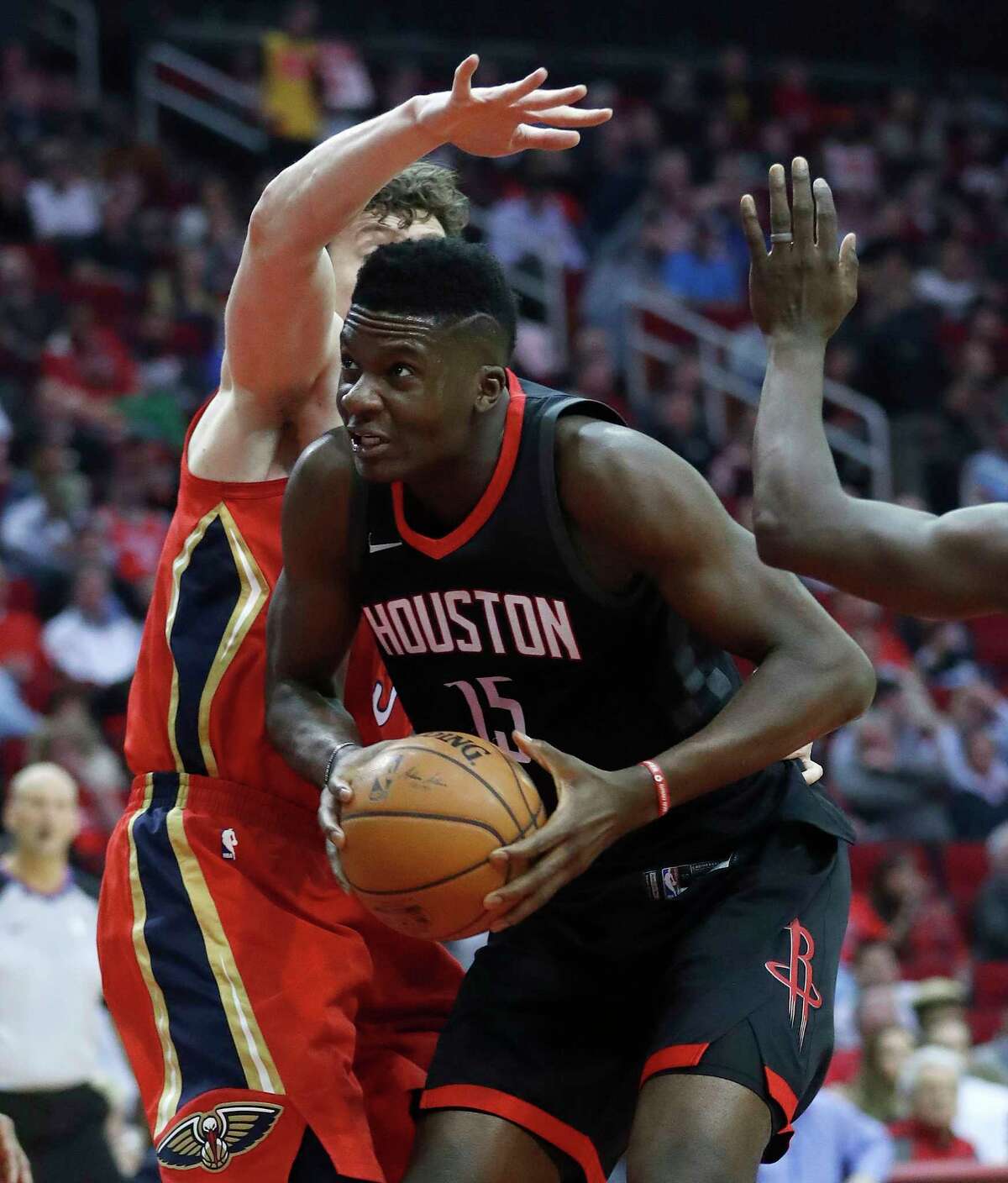 Houston Rockets center Clint Capela (15) dives under the basket during the first half of an NBA game at Toyota Center, Monday, Dec. 11, 2017, in Houston.