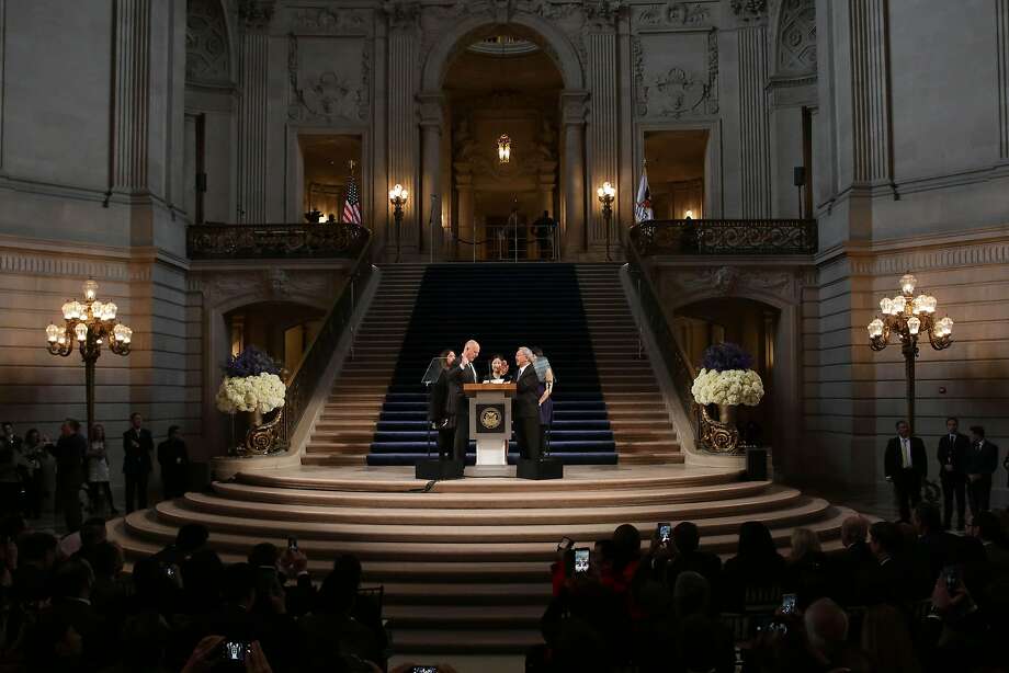 Gov. Jerry Brown (left) administers the Mayoral Oath of Office to Mayor Ed Lee in the City Hall rotunda in 2015. Photo: Lea Suzuki, The Chronicle