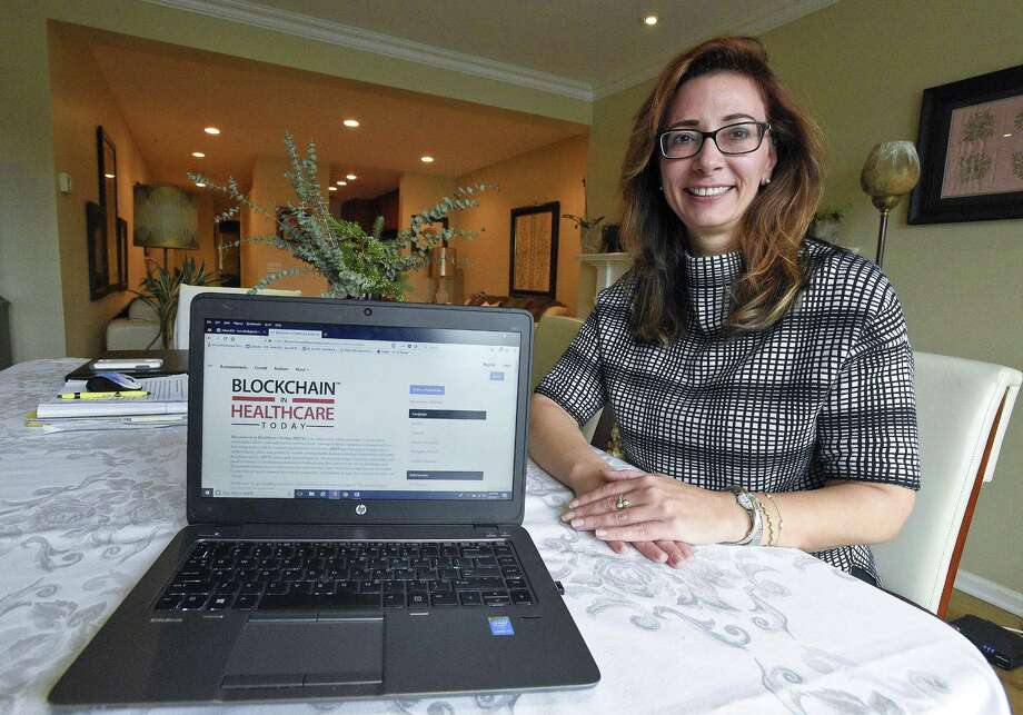 Tory Cenaj, founder and publisher of the new online journal Blockchain in Healthcare Today, is photographed, on Dec. 5, 2017, at her home in Stamford, Conn. Photo: Matthew Brown / Hearst Connecticut Media / Stamford Advocate