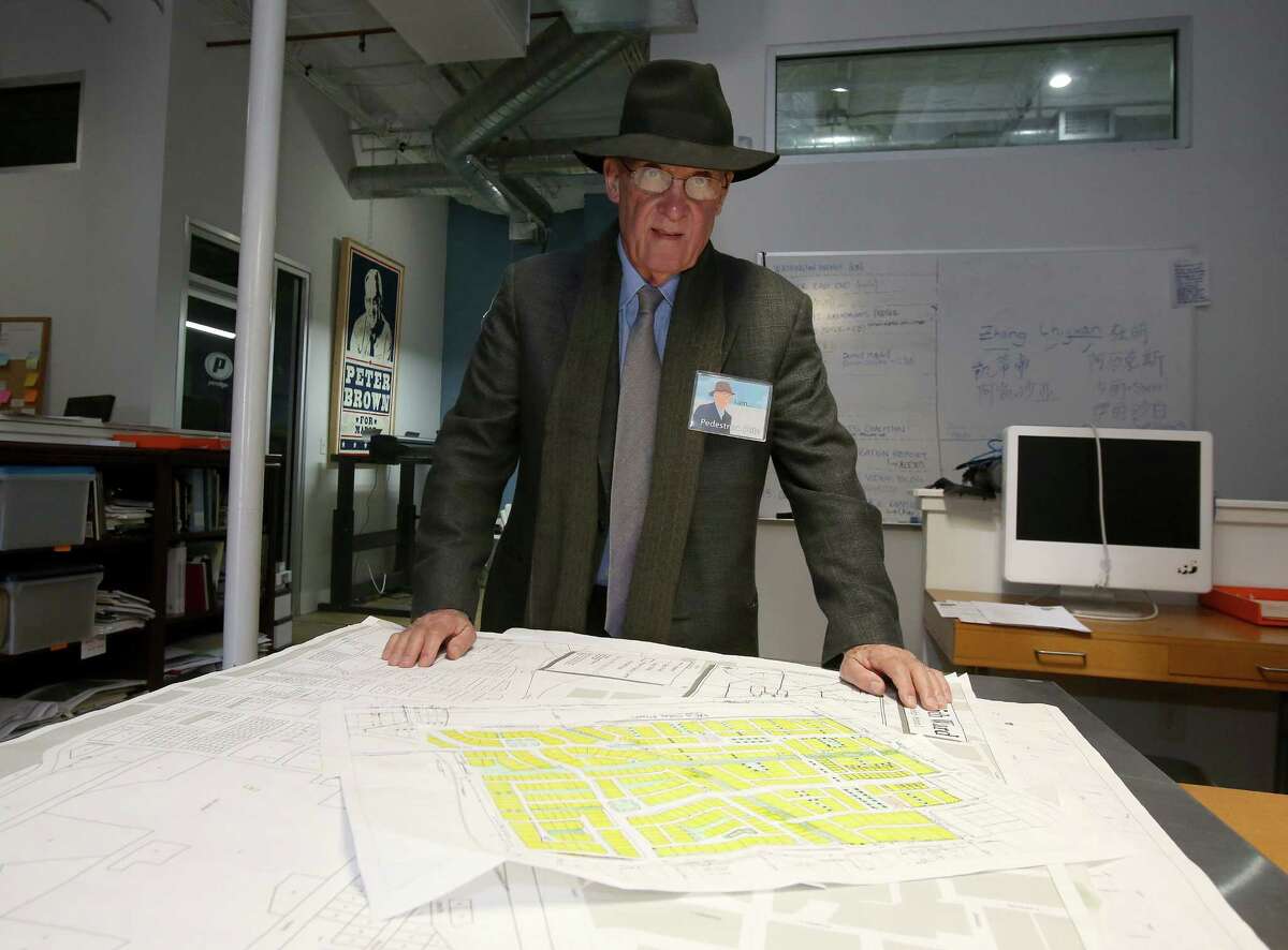 11/20/12: 11/20/12: Pete Brown with Houston street maps in his office in Houston, Texas. After very seriously running in 2009, architect and former city council member Peter Brown has transformed himself into Houston's leading utopian. His group, Better Houston, promotes urban planning and walkability. In on-line videos, Brown turns himself into a Stephen Colbert-like character, "Pedestrian Pete," who walks around the city with guests, chatting about the good, the bad and the ugly.