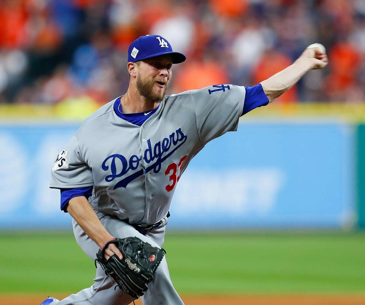 Los Angeles Dodgers relief pitcher Tony Watson (33) pitches during the eighth inning of Game 4 of the World Series at Minute Maid Park on Saturday, Oct. 28, 2017, in Houston. ( Brett Coomer / Houston Chronicle )