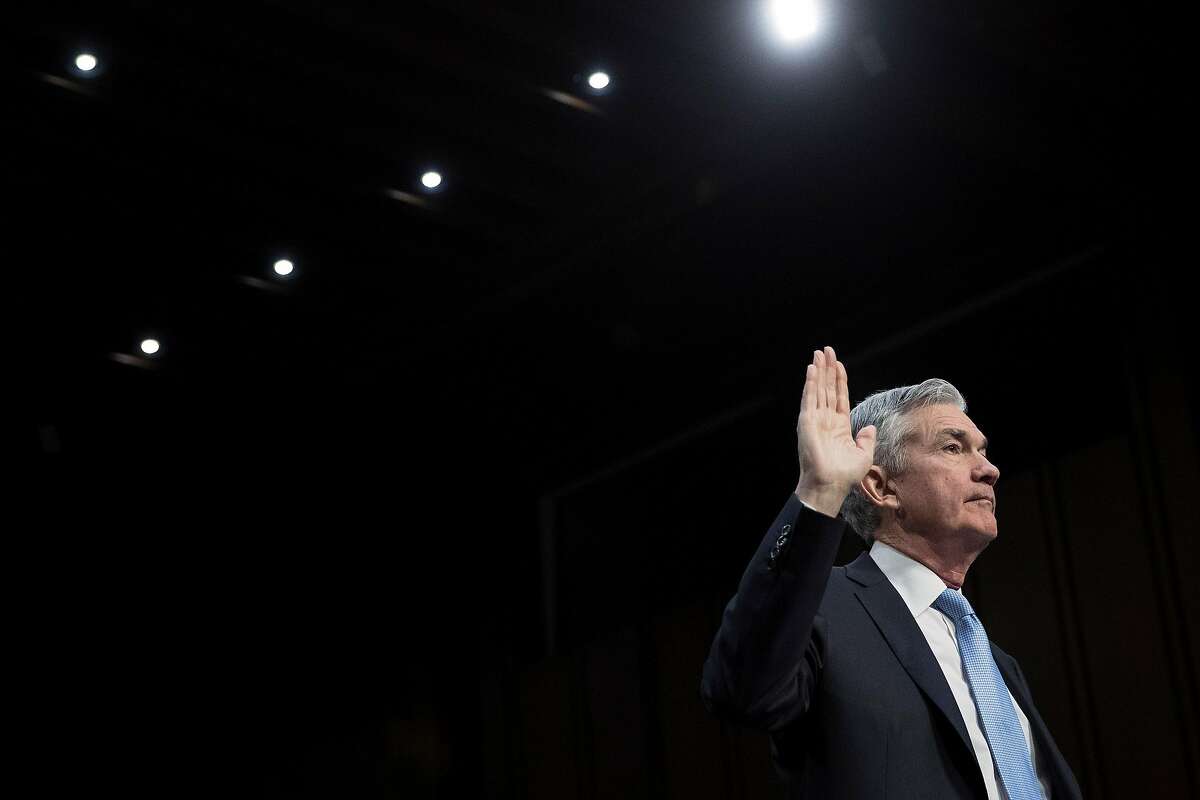 FILE - Jerome Powell is sworn in for his Senate confirmation hearing to become the Federal Reserve chairman, in Washington, Nov. 28, 2017. The Federal Reserve is expected to end the year by raising its benchmark interest rate for just the fifth time since the financial crisis. (Tom Brenner/The New York Times)