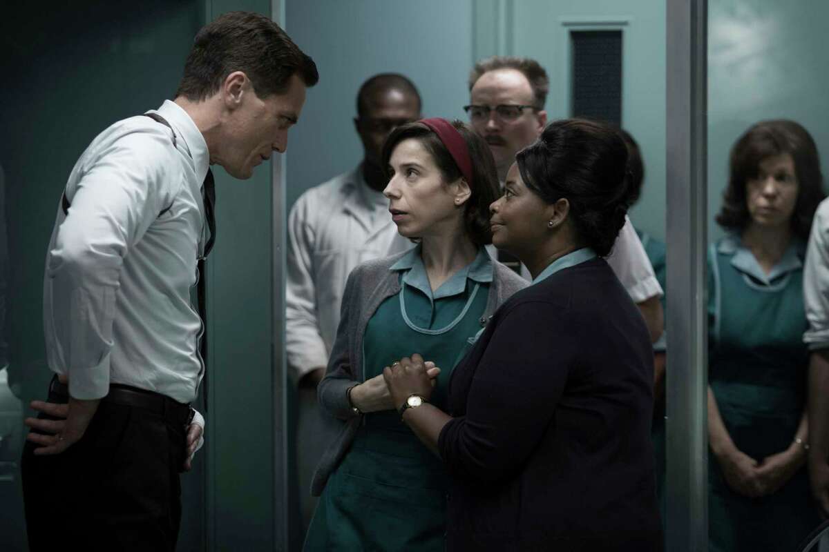 This image released by Fox Searchlight Pictures shows Michael Shannon, from left, Sally Hawkins and Octavia Spencer in a scene from the film, "The Shape of Water." Guillermo del ToroÂ?’s Cold War fantasy tale is the leading nominee at the CriticsÂ?’ Choice Awards. It received 14 nominations, including for best picture, best actress for Sally Hawkins and best director for del Toro. (Fox Searchlight Pictures via AP)