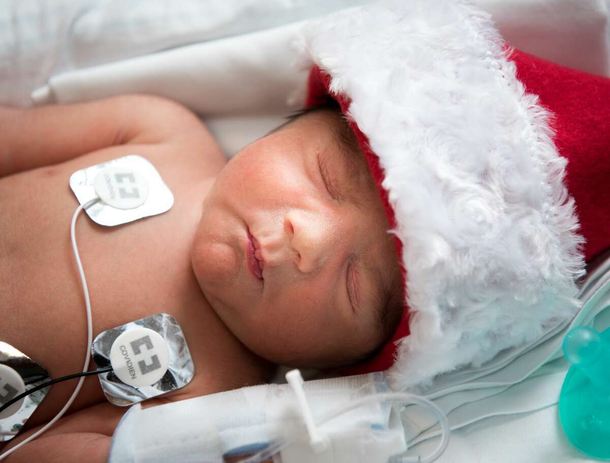 Santa Claus recently paid a visit to Texas Children's Hospital in Houston to help comfort families with babies in the Neonatal Intensive Care Unit (NICU).