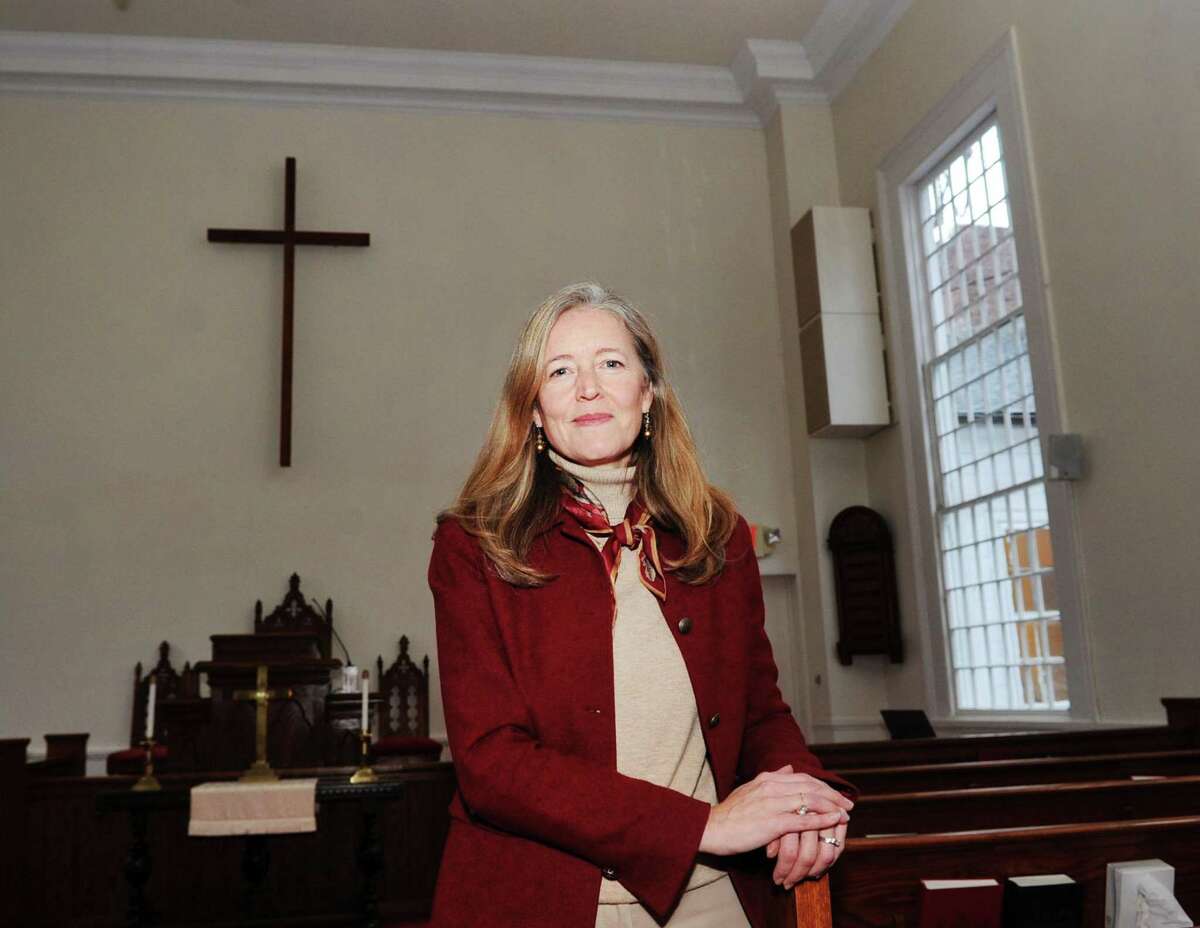 Heather Wright, director of the Center for Hope and Renewal in the sanctuary at the center located at 237 Taconic Road in Greenwich, Conn., Tuesday, Dec. 12, 2017. The Center for Hope and Renewall, that calls itself a "faith-friendly professional counseling and resource center," has been operating out of the Stanwich Congregational Church since Sept. 2007 without formal approval from the Planning and Zoning Commission. Neighbors are upset that the center is operating a business, bringing potentially dangerous mentally unstable people into their residential neighborhood. The Stanwich Church is now requesting P&Z approval for the center.
