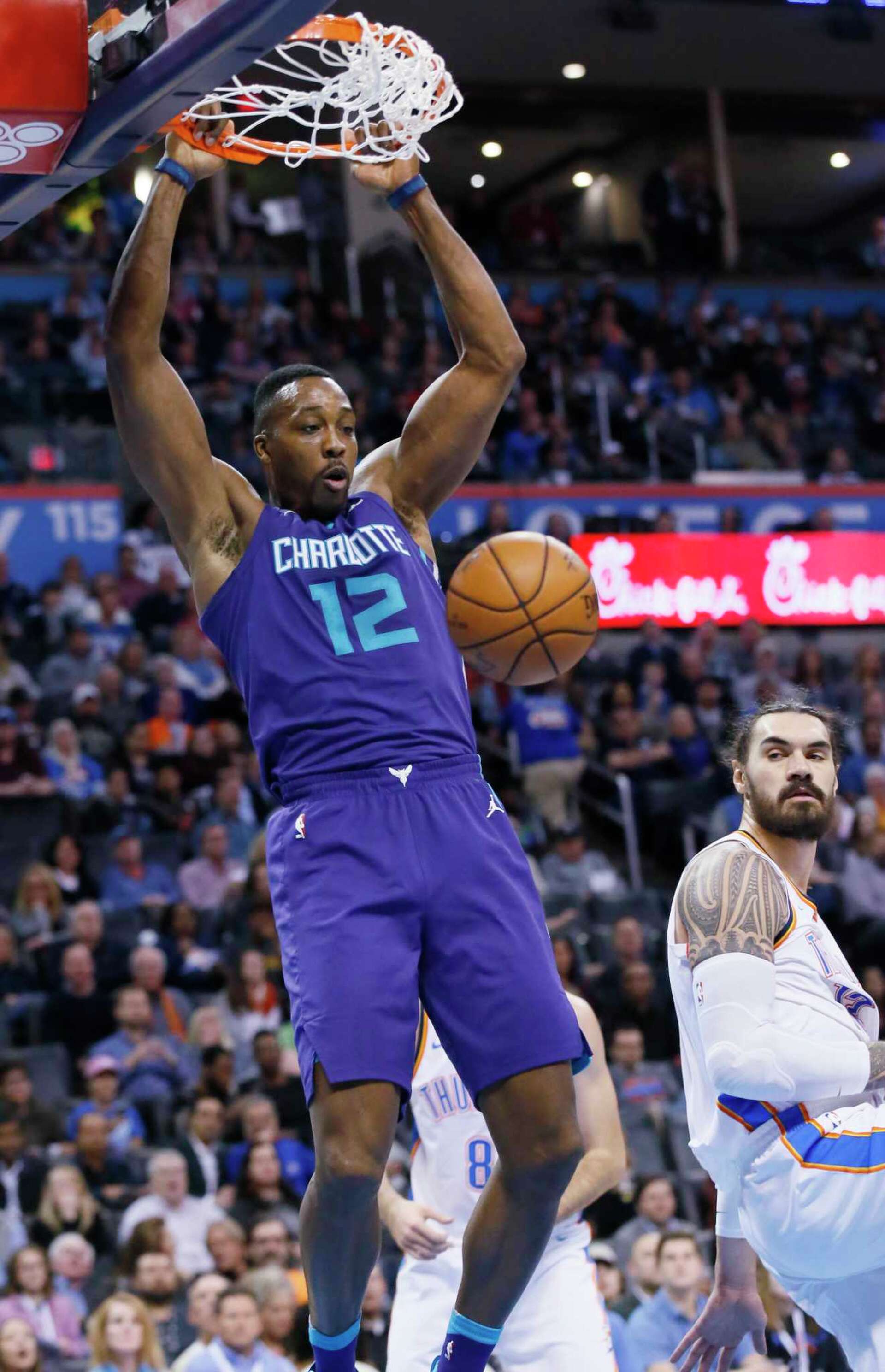 Dwight Howard finds a new energy in Charlotte, image size:1920x2977