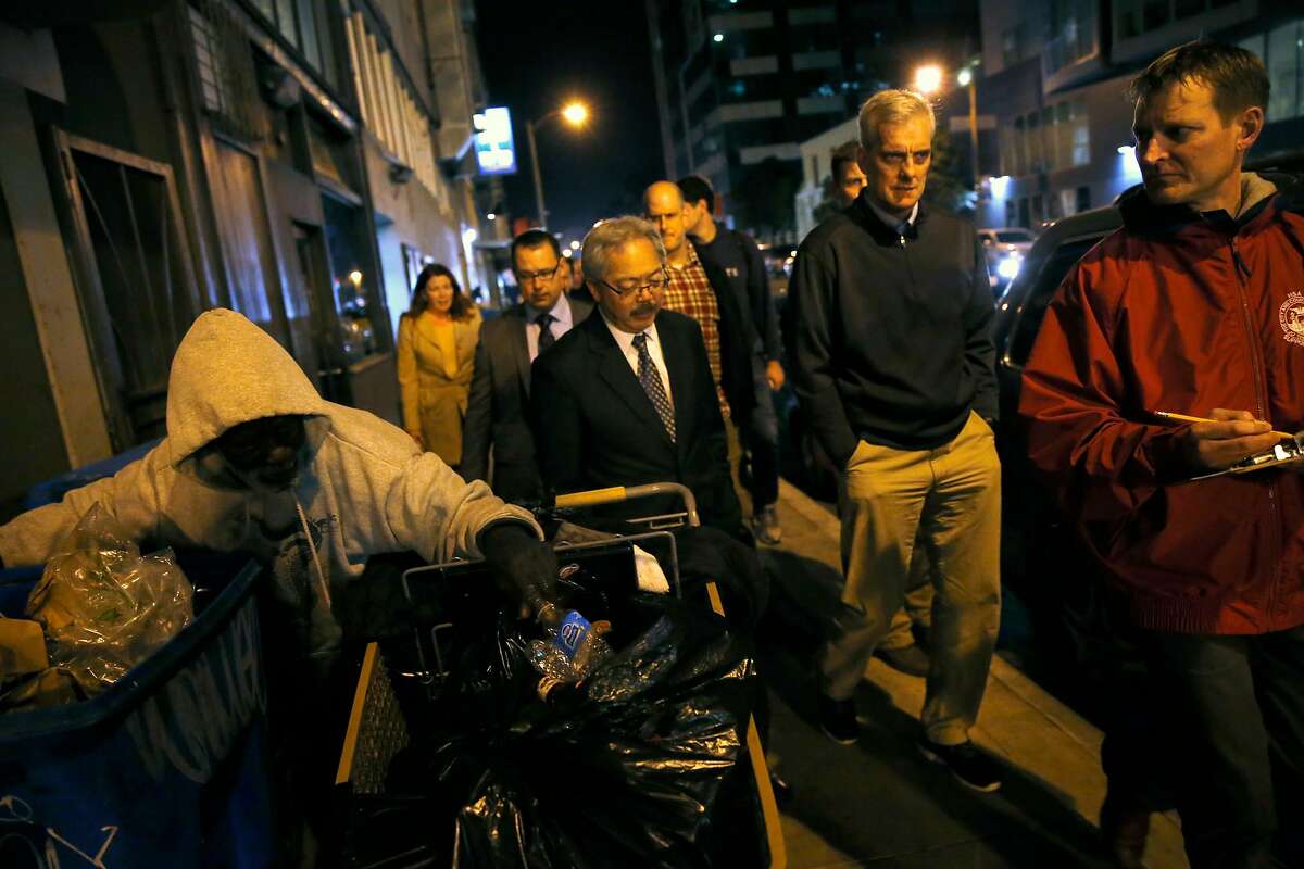 President Barack Obama's Chief of Staff Denis McDonough joins San Francisco Mayor Ed Lee and San Francisco Director of Human Services Agency Trent Rhorer, (right) during annual homeless count in San Francisco, Calif., on Thursday, January 29, 2015.