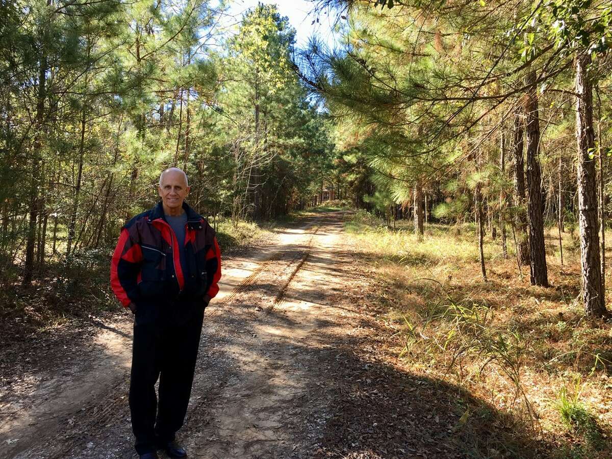 Charlie Horton stands at the entrance to his property in Montgomery County In December, 2017. He opposes Conroe's plans to annex the area.