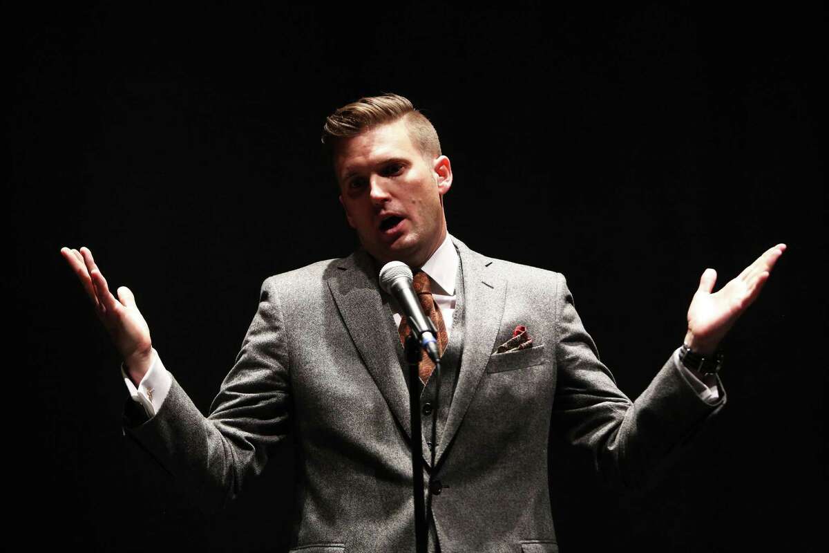 White nationalist Richard Spencer holds a news conference before giving a speech at the University of Florida in October.