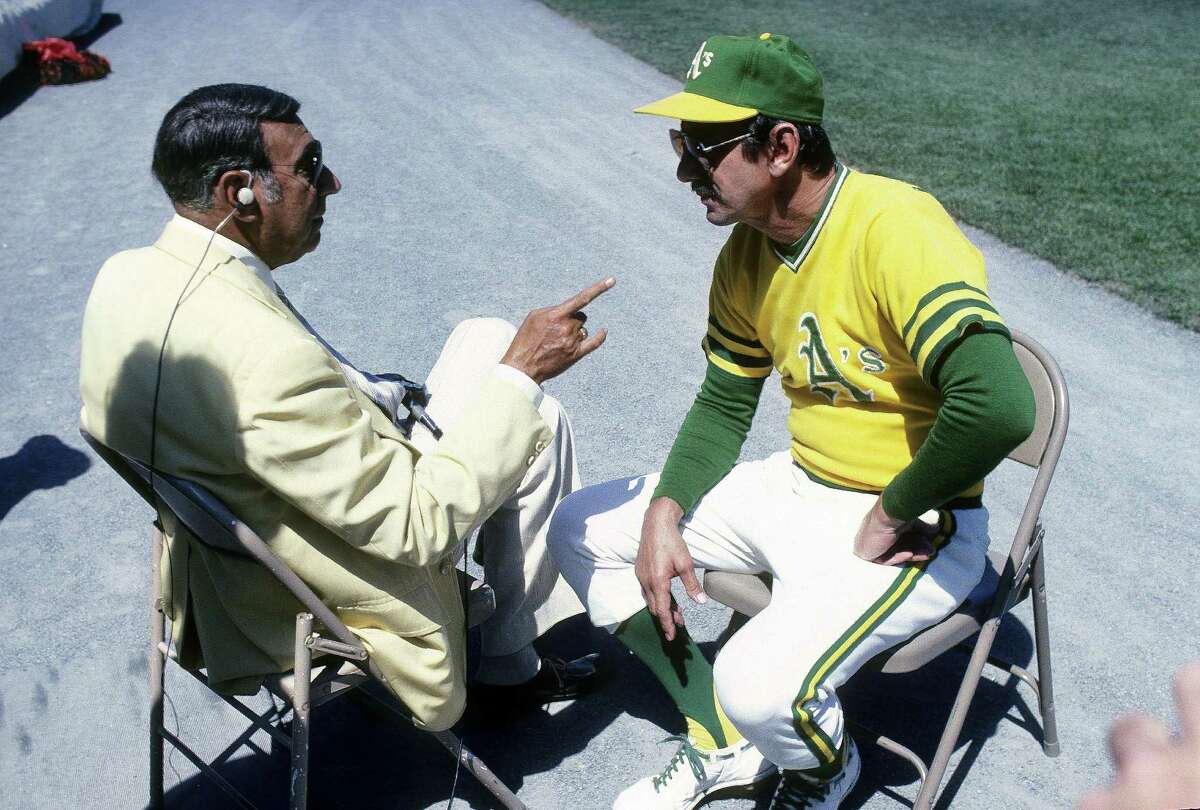 CIRCA 1980's: Manager Billy Martin of the Oakland Athletics being interviewed by ABC's sports commentator Howard Cosell before a MLB baseball game circa early 1980's. Martin managed the Athletics from 1980-82. (Photo by Focus on Sport/Getty Images)