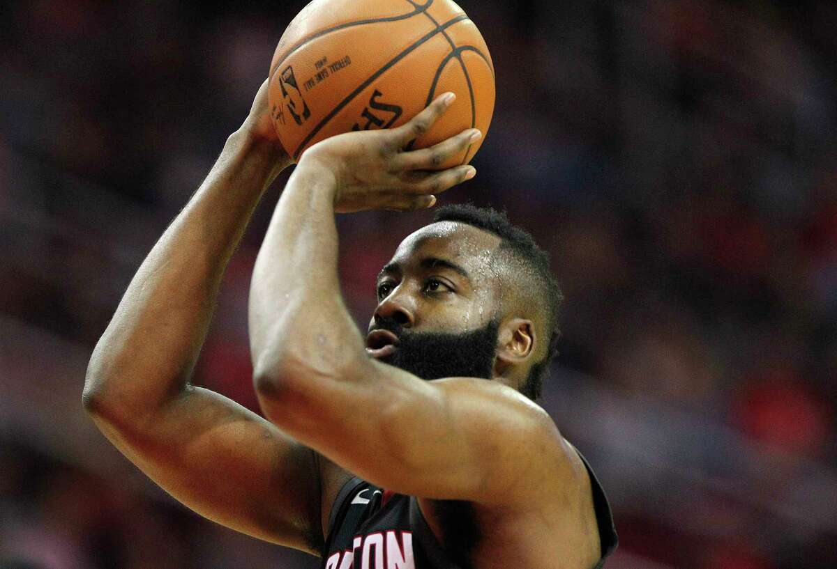 Houston Rockets guard James Harden (13) makes a free throw that was a result of a technical against the Charlotte Hornets at the Toyota Center on Wednesday, Dec. 13, 2017, in Houston.