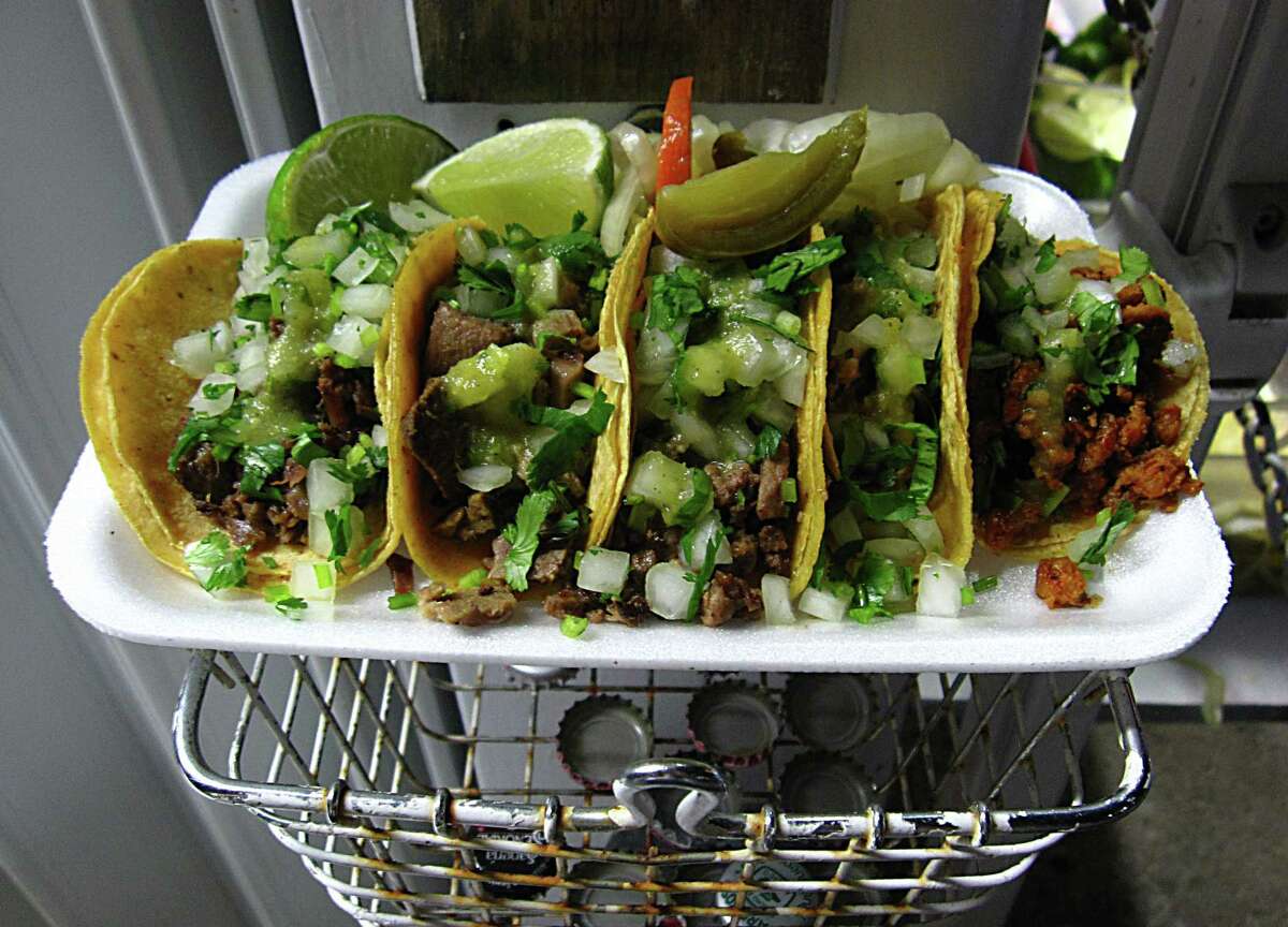 The Tacos La Salsita truck on Marbach Road draws a diverse nighttime crowd. From tacos to barbecue to sandwiches and beyond, the San Antonio food truck scene will take center stage for the Express-News' 52 Weeks of Food Trucks series in 2021.