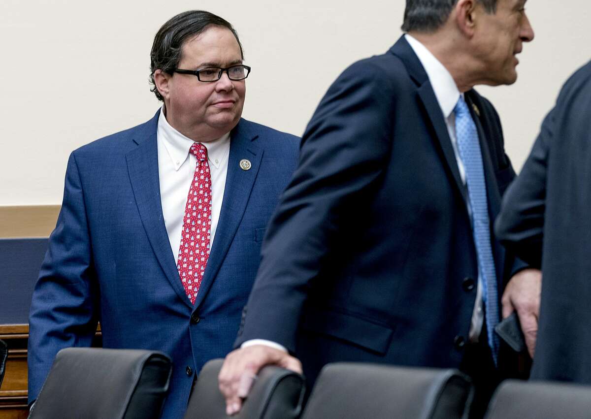Rep. Blake Farenthold, R-Texas, arrives for a House Committee on the Judiciary oversight hearing on Capitol Hill, Wednesday, Dec. 13, 2017, in Washington. Two Republicans say that Texas GOP Rep. Blake Farenthold won't seek re-election next year. The lawmaker is under pressure from sexual misconduct allegations that surfaced three years ago but have come under renewed focus. (AP Photo/Andrew Harnik)