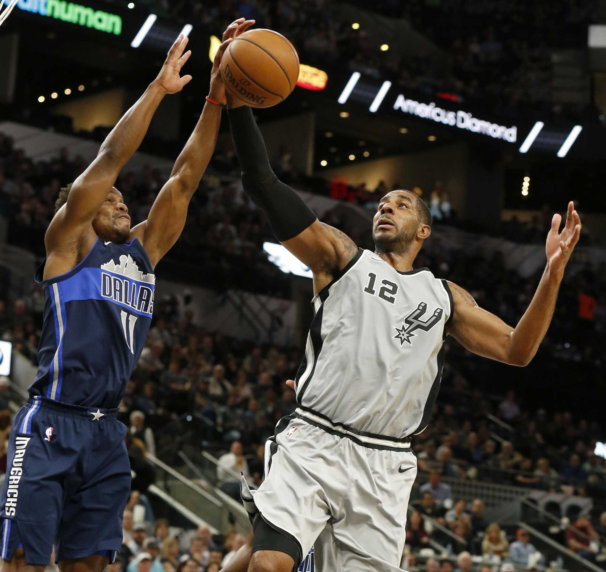 Starting lineup intact, Spurs begin putting pieces together