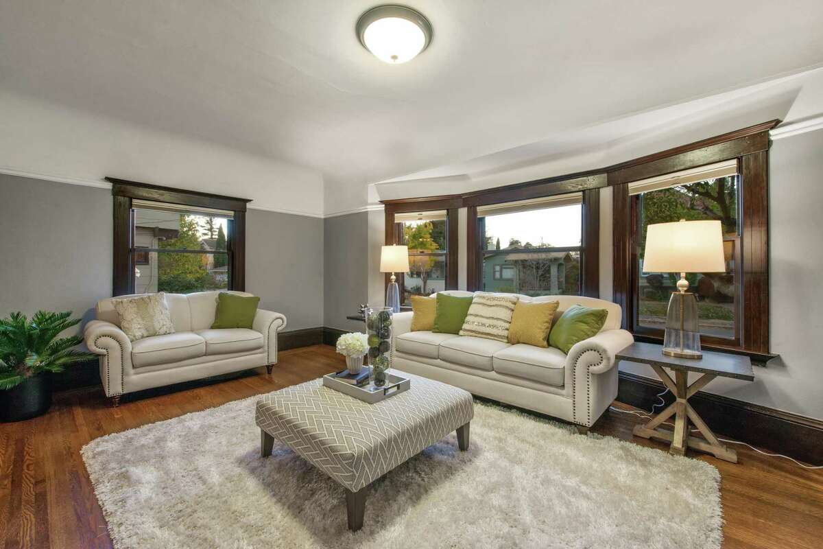 Soaring gable, original details define classical home in Alameda