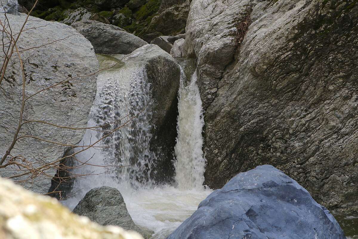 Upper Falls at Little Yosemite. The headwaters of Alameda Creek has been recharged by recent rainfall to create surging stream flows and miniature waterfalls in a pool-and-drop rocky gorge of Little Yosemite at Sunol-Ohlone Regional Wilderness in East Bay