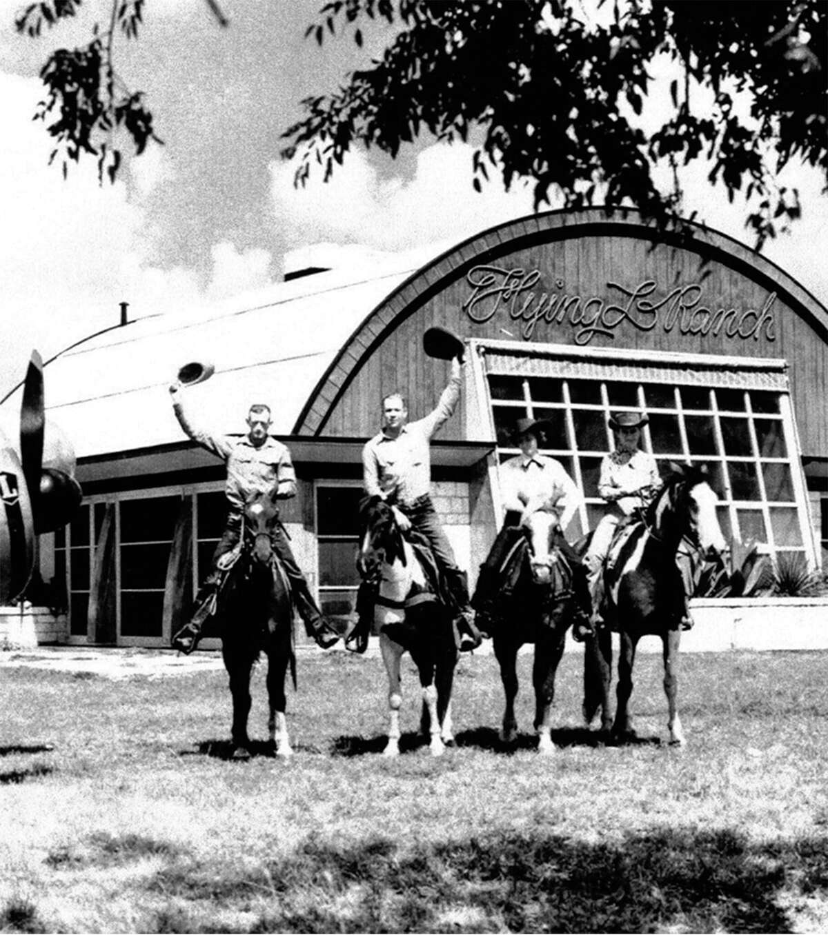 Wranglers gather in front of the pilots' lounge at the Flying L Ranch in 1948. When the Flying L opened in 1947, it had its own airport.