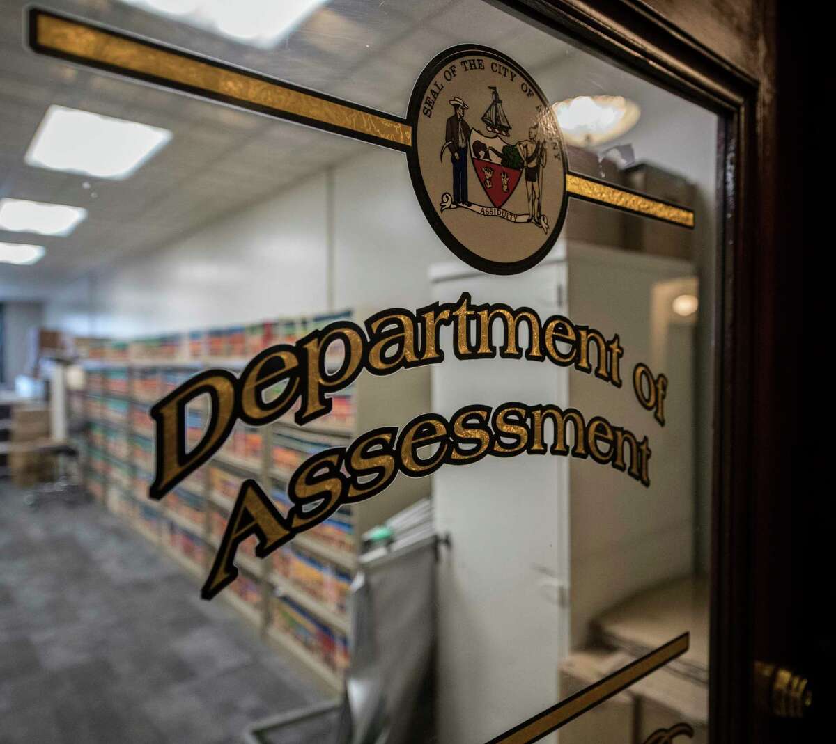 The logo on the door of the Department of Assessment in City Hall Thursday Dec 14, 2017 in Albany, N.Y. (Skip Dickstein/ Times Union)