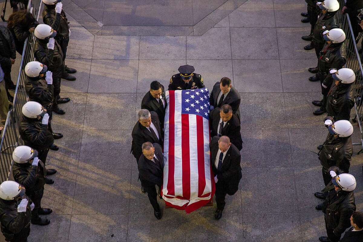 The casket of San Francisco Mayor Ed Lee is carried into City Hall on Friday, Dec. 15, 2017, in San Francisco, Calif. Mayor Ed Lee was lain in state at the rotunda of City Hall. Lee died on Tuesday from a heart attack. He was 65 years old.