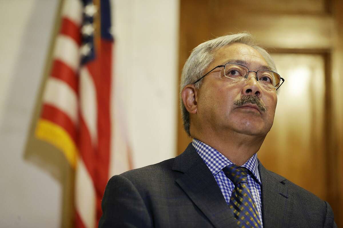 FILE - In this Aug. 15, 2017, file photo, San Francisco Mayor Ed Lee listens to questions during a news conference at City Hall in San Francisco. San Francisco officials will honor the life of Mayor Ed Lee with a memorial celebration Sunday, Dec. 17, 2017, in the rotunda of City Hall. The public will also be able to pay respects Friday as his body lies in state in the rotunda. Lee was 65 years old and the city's first Asian-American mayor. (AP Photo/Eric Risberg, File)