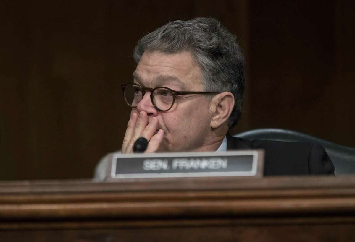 Sen. Al Franken, who said last week he will resign after mounting allegations of sexual misconduct, attends a committee hearing. A reader says Franken is a victim of a “take no prisoners” mindset.