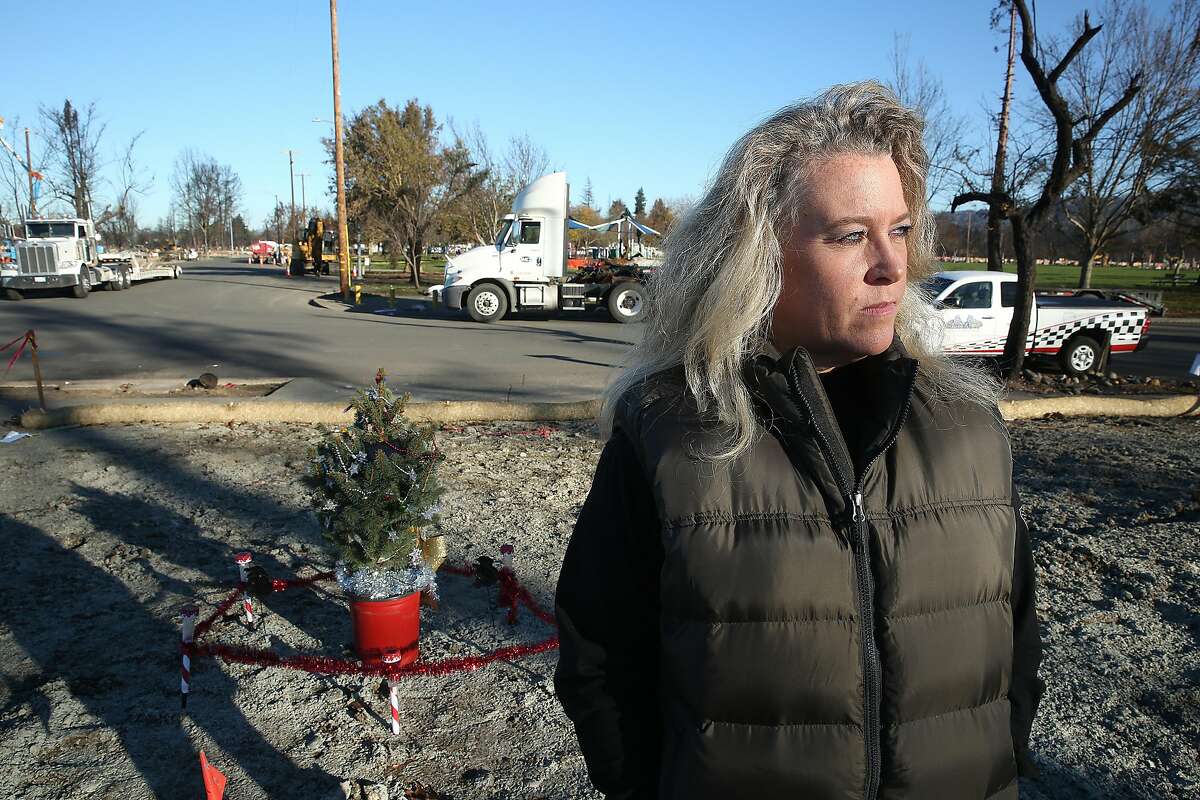 Samantha Eggert on her property at Coffee Park where her home burned down during last month's Santa Rosa fire on Wednesday, December 6, 2017, in Santa Rosa, CA.
