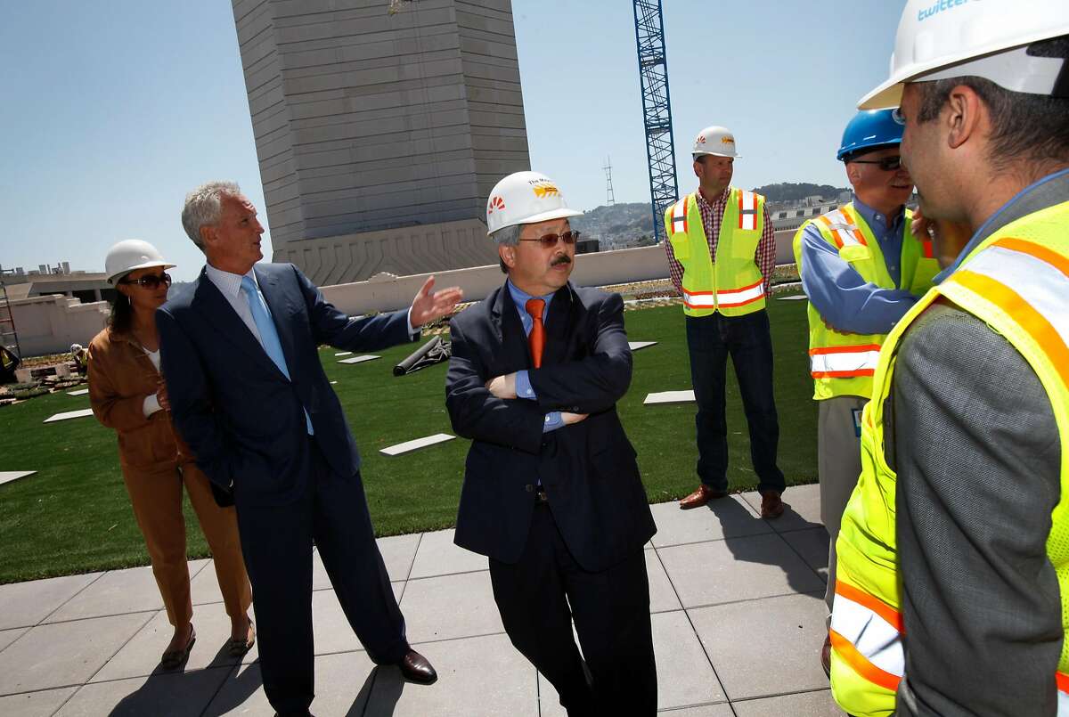 Mayor Ed Lee (center) tours the rooftop garden of the Furniture Mart in May 2012, under renovations to become Twitter’s offices.