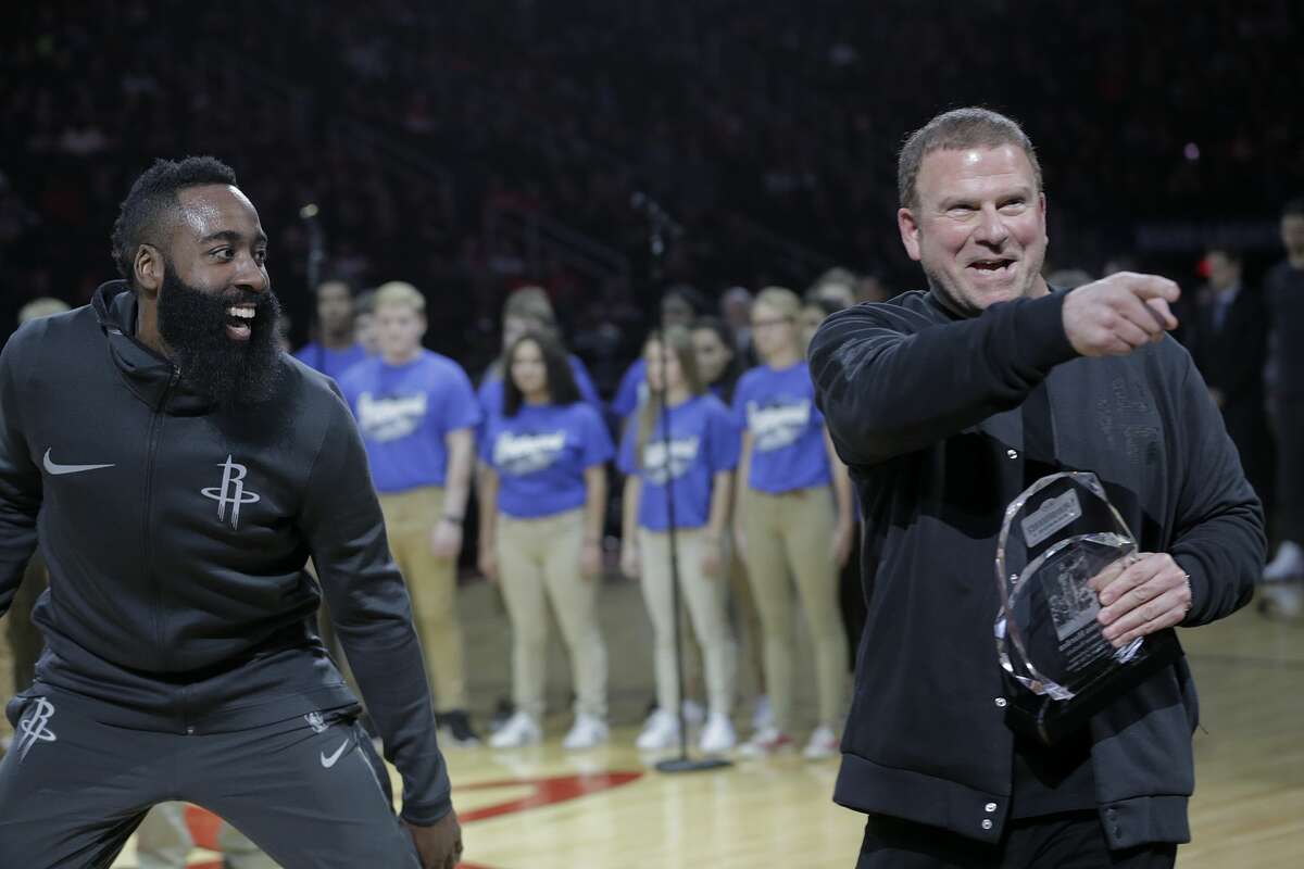 Houston Rockets owner Tilman Fertitta and guard James Harden (13) joke around after an award presentation before the Houston Rockets and San Antonio Spurs game at the Toyota Center on Friday, Dec. 15, 2017, in Houston. ( Elizabeth Conley / Houston Chronicle )