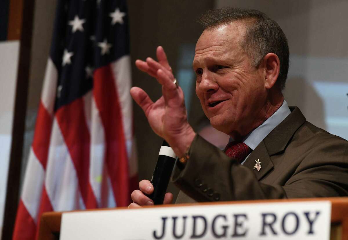 Roy Moore, Republican candidate for the U.S. Senate, addresses supporters after a historic loss to Democrat Doug Jones last week.﻿