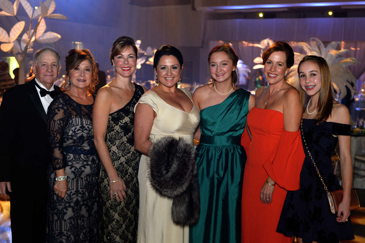 From left: Robert Marino, Terri Cash, Ellen Phelan, Sarah Frasher, Ellie Burns, Monica and Josie Broussard at the Symphony League of Beaumont's annual ball at the Beaumont Civic Center on Saturday night. The event provides support for the League and the Symphony of Southeast Texas. Photo taken Saturday 12/16/17 Ryan Pelham/The Enterprise